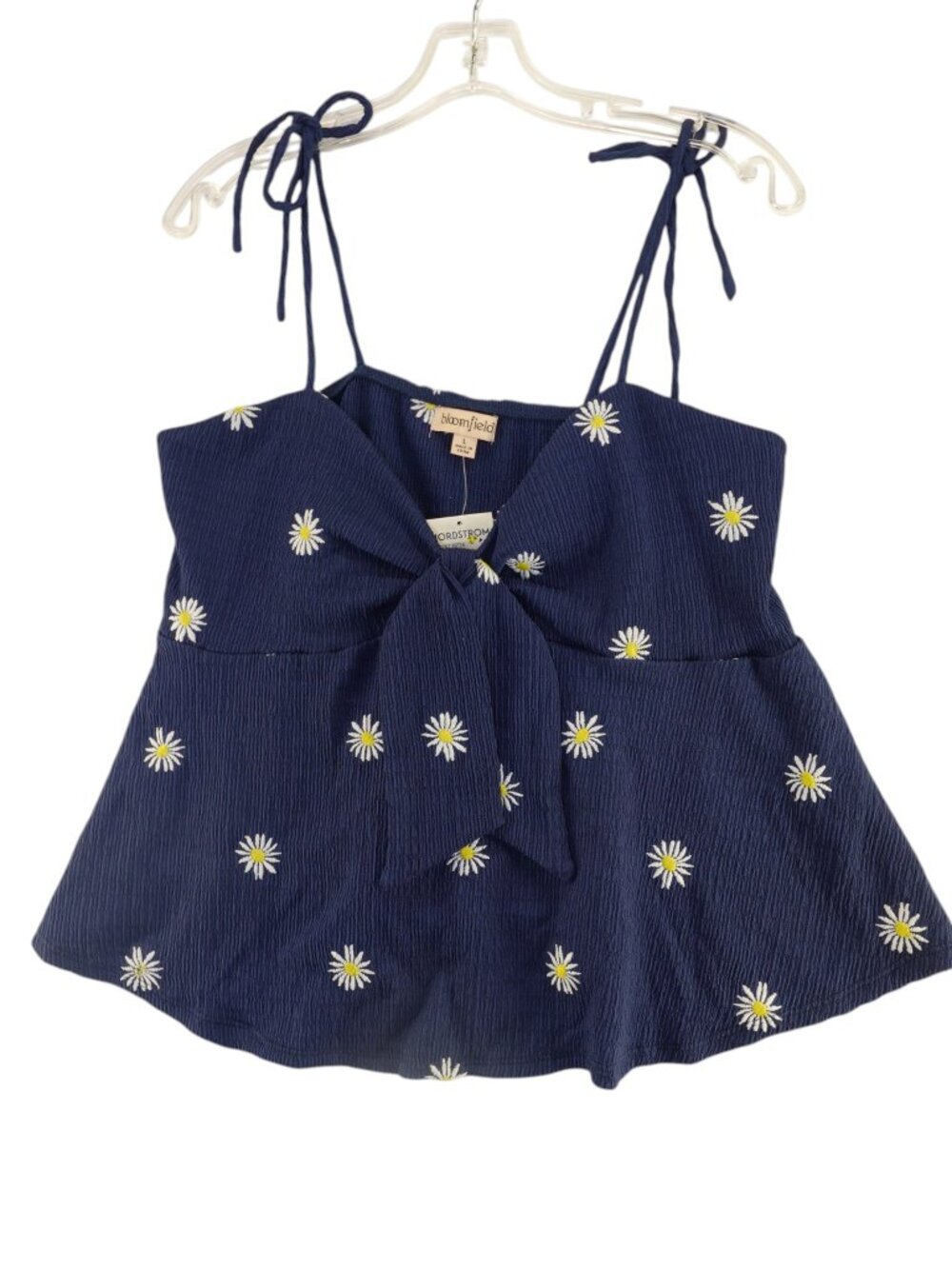 Women's Bloomfield babydoll cami top featuring white daisy embroidery front tie
